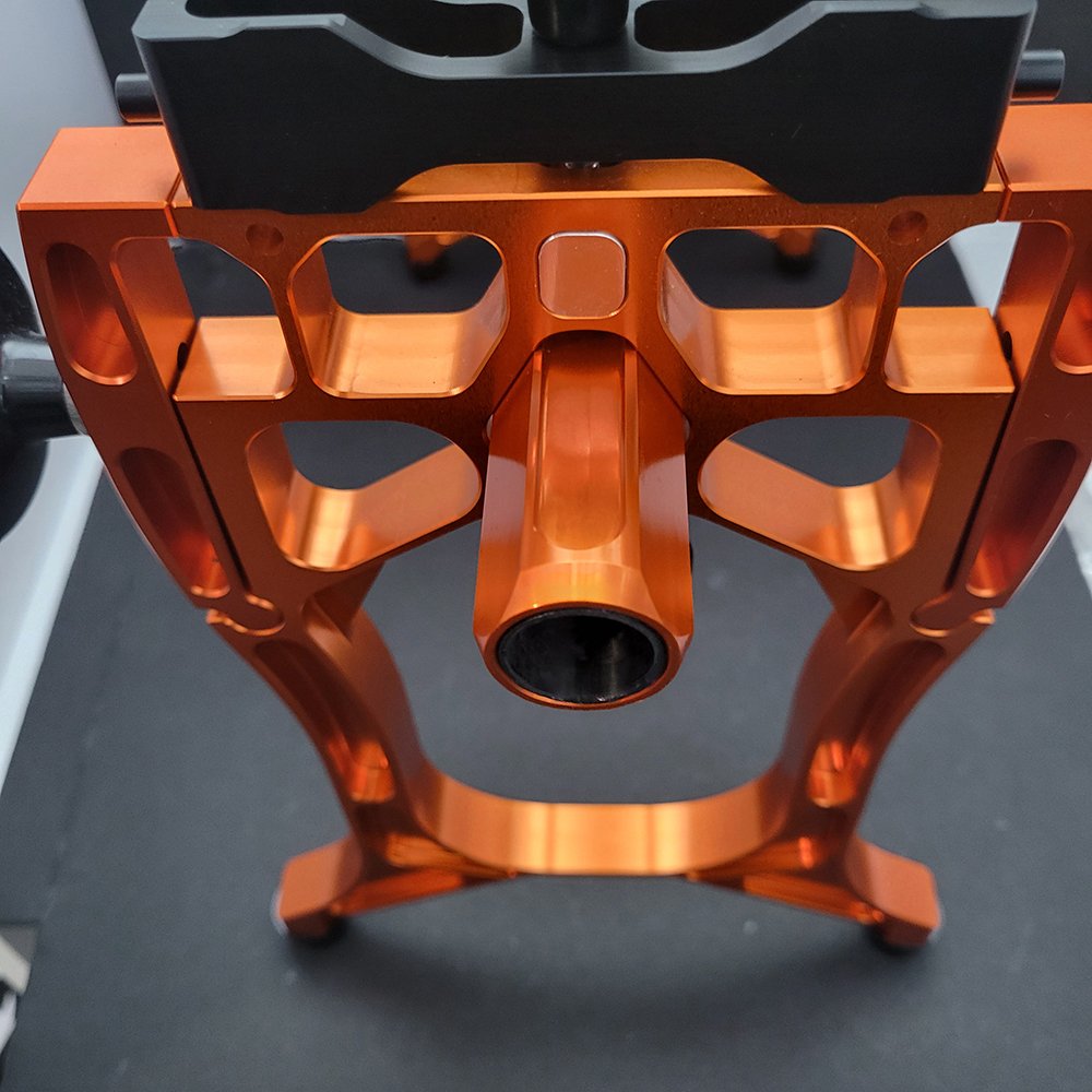 Skate-Tec Pro Jig – front view of orange CNC aluminium frame and clamp